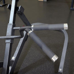 Plate loaded Excel T-Bar Row machine by Muscle D Fitness, commercial gym equipment with T-bar handle and weight plates for strength training.