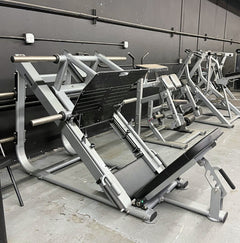 Muscle D Fitness Pro Strength Heavy Duty Plate Loaded Leg Press machine with sturdy frame and weight plates for strength training.
