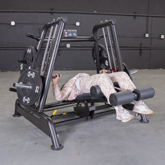 Muscle D Fitness Power Leverage V2 flat and decline convergent plate-loaded bench with padded seat and backrest for strength training.