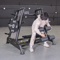 Muscle D Fitness Power Leverage V2 flat and decline convergent plate-loaded bench with padded seat and adjustable backrest.