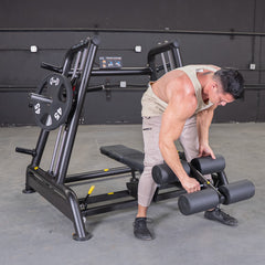 Muscle D Fitness Power Leverage V2 flat and decline convergent bench for plate-loaded strength training, showing padded seat and adjustable angles.