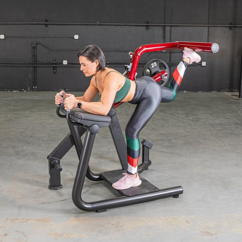Muscle D Fitness Power Leverage V2 Glute Kick, a fitness equipment with padded support and adjustable resistance for glute workouts.