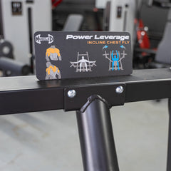 Muscle D Fitness Power Leverage V2 incline pec fly plate-loaded chest machine with adjustable incline and padded arm supports.