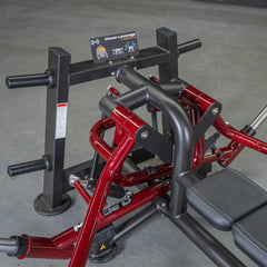 Muscle D Fitness Power Leverage V2 Lying Pec Fly plate-loaded machine with padded seat and adjustable arm supports.