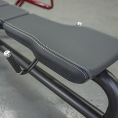 Muscle D Fitness Power Leverage V2 Lying Pec Fly plate-loaded machine with padded seat and arm handles for chest workouts