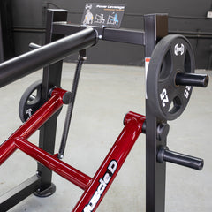 Muscle D Fitness Power Leverage V2 Overhead Triceps plate-loaded gym equipment with padded handles and sturdy frame.