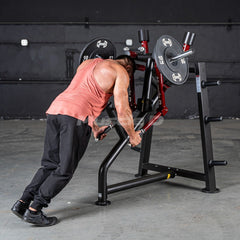 Muscle D Power Leverage V2 plate-loaded rear delt machine for shoulder workouts in a commercial gym setting.