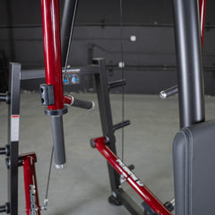 Muscle D Fitness Power Leverage V2 seated pec fly and rear delt combo machine with plate-loaded design and weight storage.