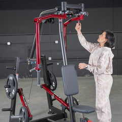 Muscle D Fitness Power Leverage V2 seated pec fly and rear delt combo machine with plate-loaded design and weight storage.