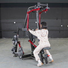 Muscle D Fitness Power Leverage V2 seated pec fly and rear delt combo machine with plate-loaded design and weight storage.