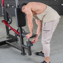 Muscle D Fitness Power Leverage V2 seated pec fly and rear delt combo machine with plate-loaded design and weight storage.