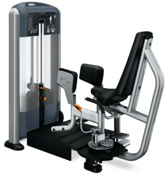 Muscle D Fitness Precor Discovery Series outer thigh exercise machine with padded seat and adjustable resistance for leg workouts.