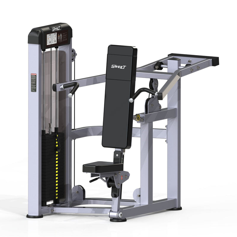 Muscle D Fitness Sweet Selectorized Shoulder Press machine with padded seat and adjustable weight selector for strength training.
