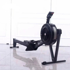 Full-body workout with 24 Hour Sport foldable water rowing machine showing water tank, handle, and adjustable seat for rowing exercise