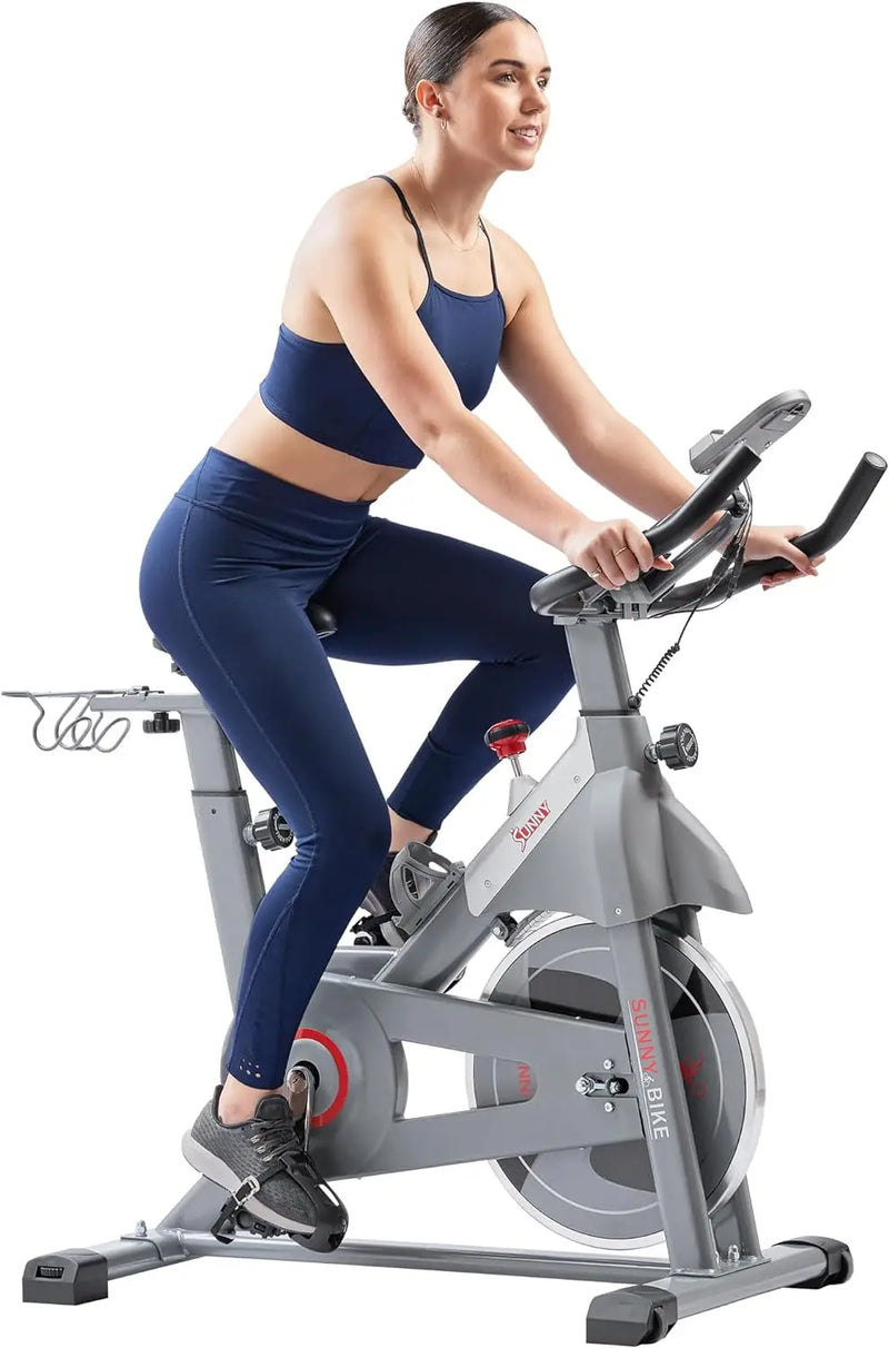 24 Hour Sport Connected Fitness Exercise Bike showing adjustable seat, digital display, and handlebar for home cardio workouts