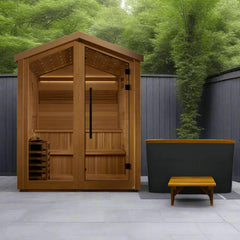 Golden Designs Kaarina 6-person red cedar outdoor sauna with Harvia electric heater, featuring wooden interior and sauna accessories.