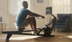 Hydrow Wave-1 Pilates rowing machine in Pirate Black by Modern Reform, featuring a sleek design and digital display.
