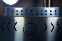North Shore Sauna XL wood stove inside a portable sauna tent, designed for home sauna relaxation and heat therapy.