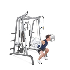 24 Hour Sport home gym rack with Smith cage and leg press, sturdy steel construction for strength training and fitness at home.