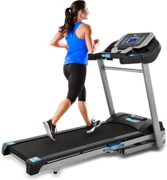 Folding Smart Treadmill with handlebar controls from 24 Hour Sport, showing the running belt and control panel.