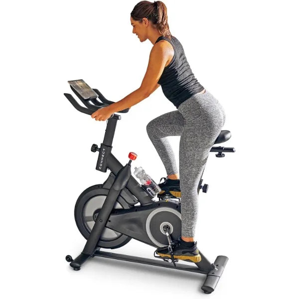 LUXHOME Smart Connect Fitness Bike displays a sleek exercise bike with digital display and adjustable seat for home workouts.