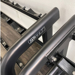 Muscle D Fitness Sweet 2-Tier Dumbbell Rack holding various dumbbells in a gym setting