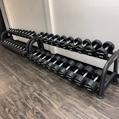 Muscle D Fitness Sweet 2-Tier Dumbbell Rack holding various dumbbells, sturdy metal frame with multiple storage slots