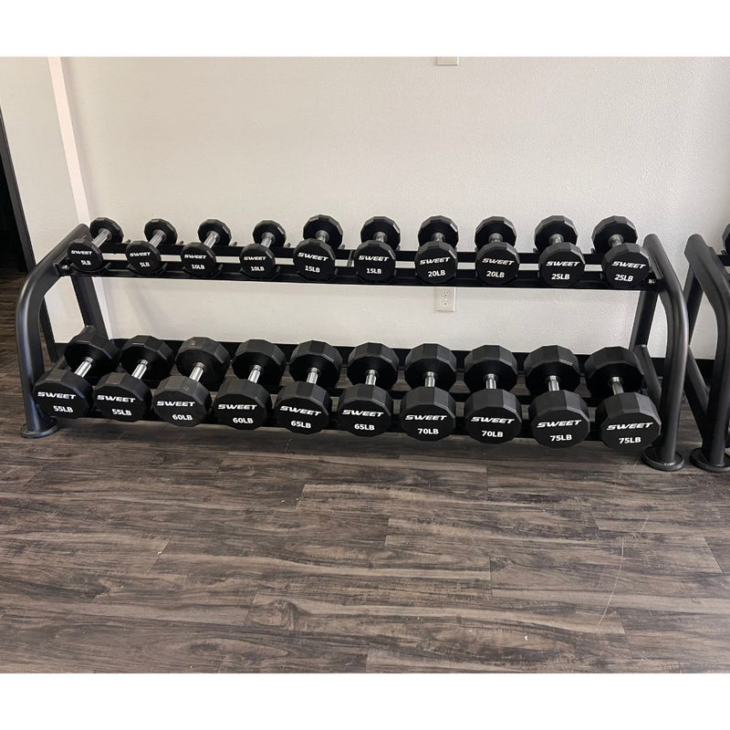 Muscle D Fitness Sweet Dumbbell Set 5-100 lb with rack, showing various weights and black handles for strength training.