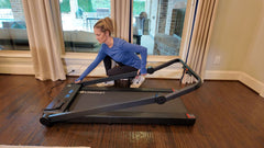 Lifesmart TM2202 treadmill with digital display and safety handrails, suitable for home gym workouts.