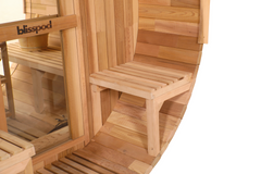 Zoppinh Blisspod Prague Canadian Red Cedar outdoor steam barrel sauna with wooden exterior and open door revealing interior seating.
