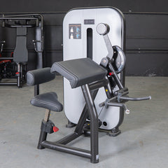 Muscle D Fitness Vogue Biceps Triceps Combo selectorized machine with padded seats and handles for arm muscle exercises.