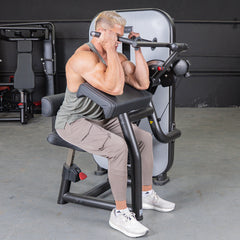 Muscle D Fitness Vogue Biceps Triceps Combo selectorized machine for arm strength training with adjustable weights and handles