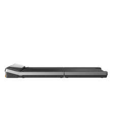 Walkingpad Z3 Kingsmith treadmill showing a sleek black design with digital display and running belt in a modern home setting.
