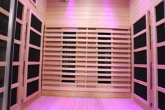 Zoppinh Finnmark FD-3 full spectrum infrared sauna for 4 persons, featuring wooden interior and multiple heater panels.