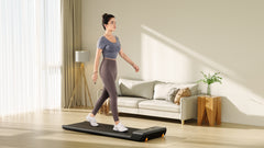 Foldable Kingsmith WalkingPad A1 Pro under-desk treadmill, compact design with digital display and sleek black finish.
