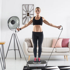 Berry Charmz vibration platform exercise machine with resistant bands, showing a compact vibration plate for fitness workouts.