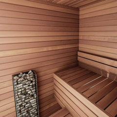 SAKSBY WHOLESALE Huum Cliff Mini 4 electric sauna heater with 3.5KW power inside a sauna room.