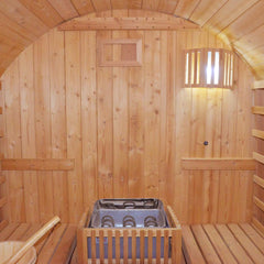 Inside view of SAKSBY WHOLESALE Thermora Ignite large outdoor wooden barrel sauna made from premium American white oak with a 4.5kW sauna heater.