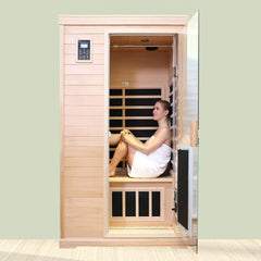 SAKSBY WHOLESALE Thermora Ivara luxury 2-person Hemlock wood infrared sauna with glass door, demonstrating its spacious interior.