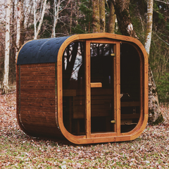 Outdoor ThermoWood sauna by Patio Elegance, featuring a compact backyard sauna with wooden exterior and glass door.