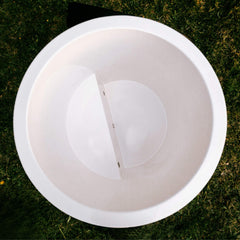 Fully assembled ThermoWood cold plunge tub by SAKSBY WHOLESALE, shown from a top view in a lifestyle setting.