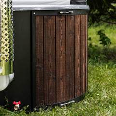 Close-up of a fully-assembled SAKSBY WHOLESALE 4-person ThermoWood wood-fired hot tub with a natural wood finish.