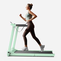 Blue WalkingPad Denise Austin 2.0 foldable treadmill by WalkingPad, showing the compact design and running surface in a home gym setting.