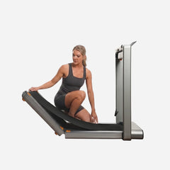 WalkingPad X214 foldable treadmill for exercise and fitness, shown in folded position for compact storage.
