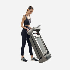 WalkingPad X218 foldable treadmill for exercise, featuring a sleek design and digital display, capable of speeds up to 11.5 MPH.