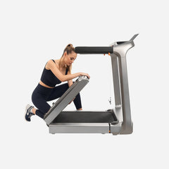 WalkingPad X218 foldable treadmill for exercise, showing its compact design and running belt with digital display and handle.