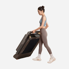 WalkingPad Z3 Hybrid+ foldable treadmill for exercise and fitness, featuring a compact design and portable carrying handle.
