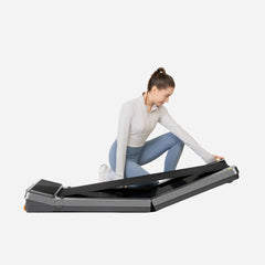 WalkingPad Z3 foldable treadmill for walking and exercise, shown in a demo setup with a sleek black design and compact frame.