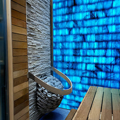 Prosaunas Himalayan Salt Sauna Wall Kit by SAKSBY WHOLESALE with blue LED lighting and sauna heater, customizable for home wellness.