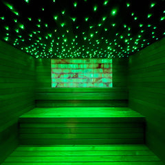 SAKSBY WHOLESALE Prosaunas large Himalayan salt sauna light kit with green LED, mounted on sauna wall for customizable lighting.